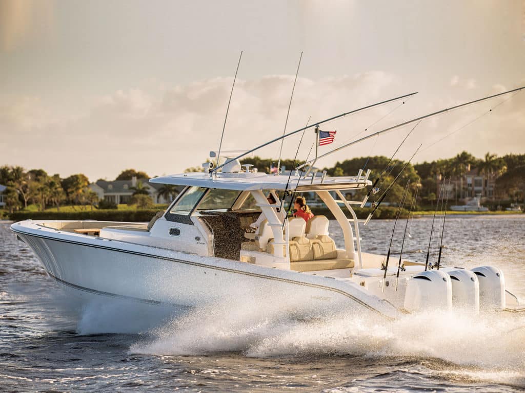 The Pursuit S 408 is sort of a hybrid. The builder incorporated a lounging area forward of the sizeable center console, with a roomy step-down cabin below it, giving the Pursuit the feel of a walkaround.
