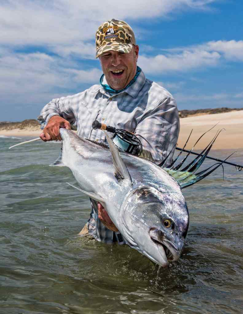 Large roosterfish held up for the camera