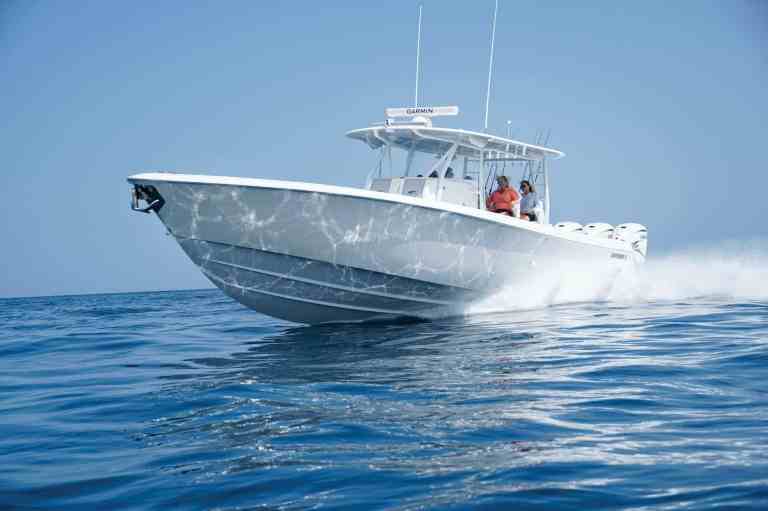 Contender 44 CB slicing through waves