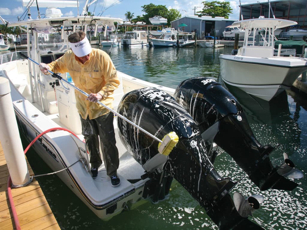 Washing outboard motors in marina