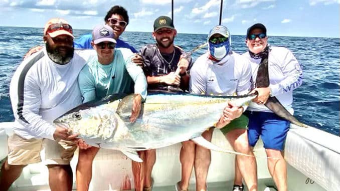 238.2 pound tuna on boat