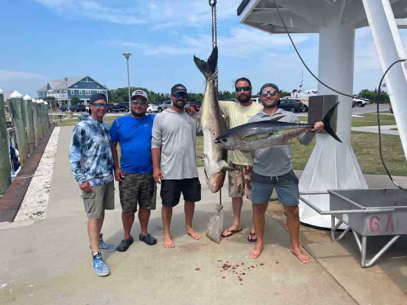 anglers with tuna and cobia