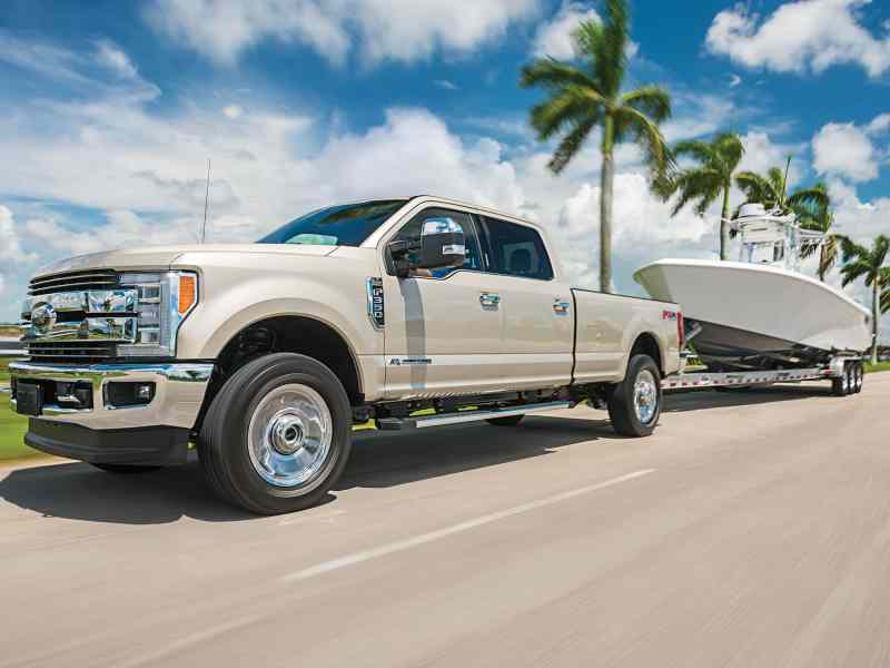 SWS1222-Towing-Boats-1 Truck towing a large boat
