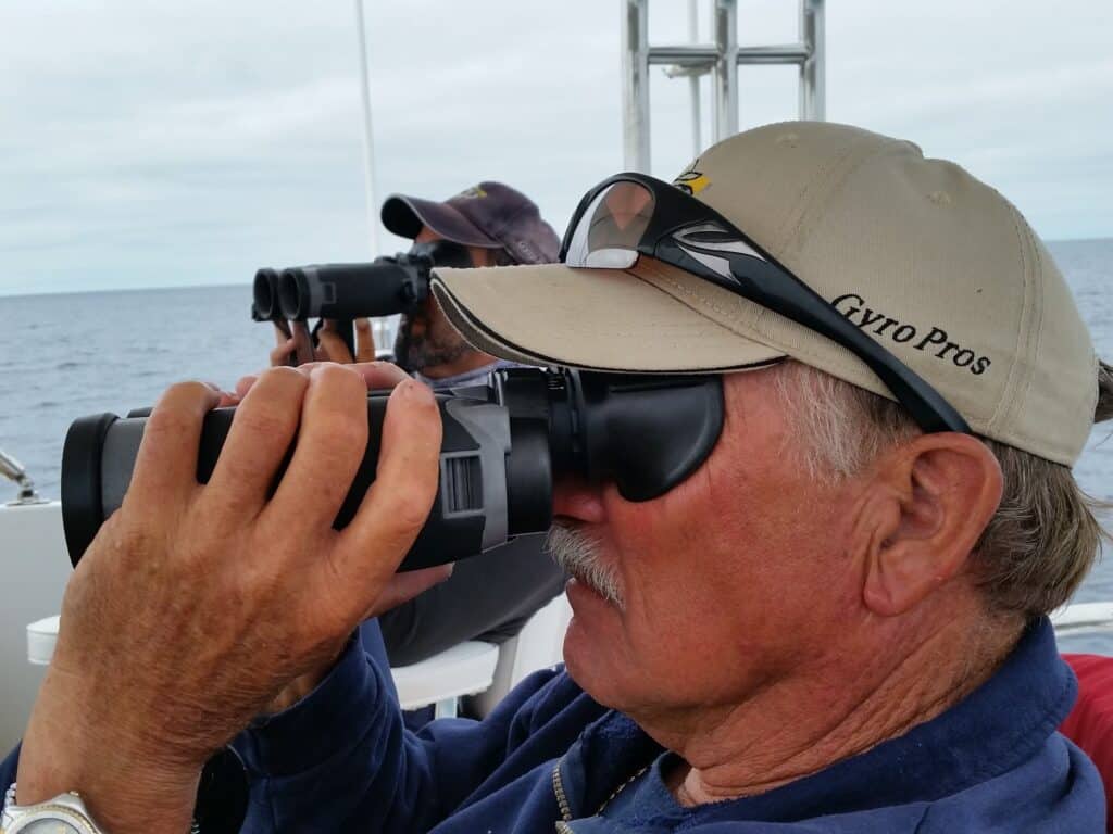 anglers using gyro-stabilized binoculars