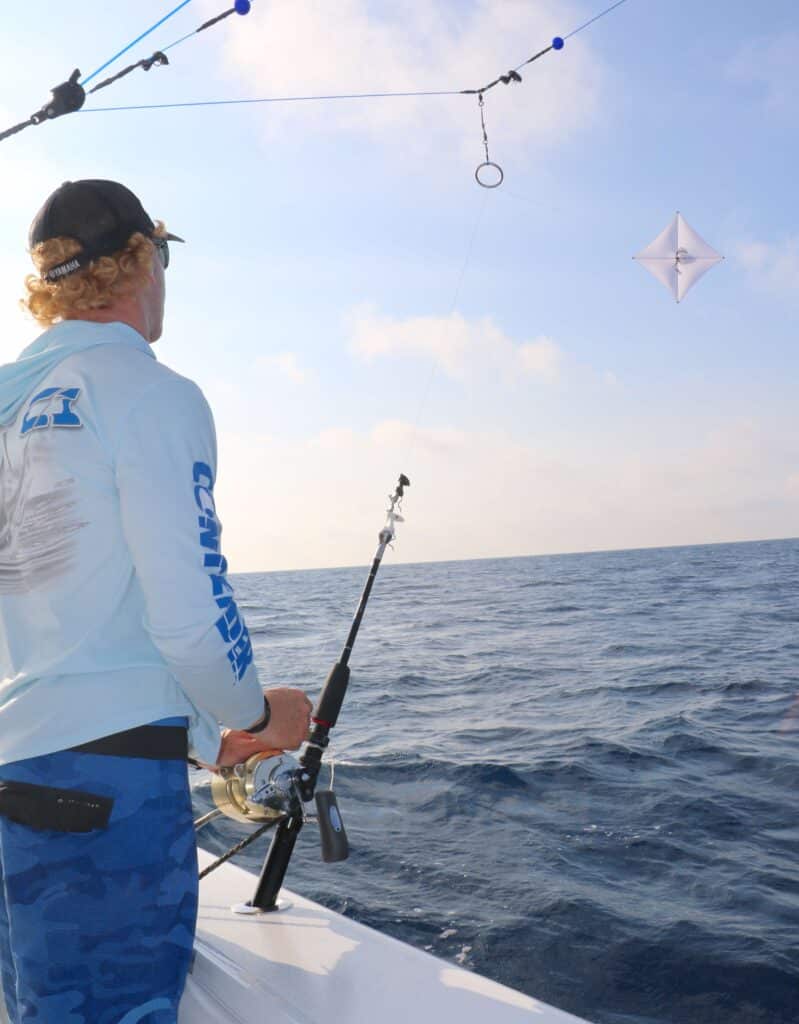 angler setting kite bait