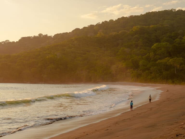 Anglers walking the beach in Panama
