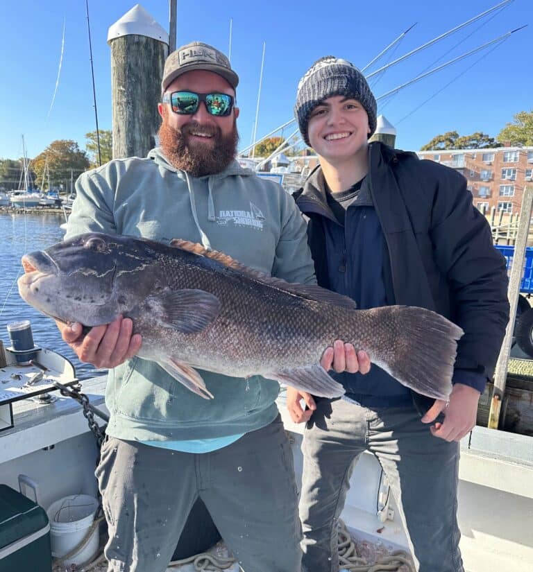 Capt. Luke Wiggins and angler Aiden Cole with Connecticut record tautog