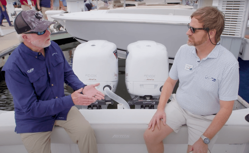 flibs-2023-cox-marine-outboards Jim Hendricks speaking with Chuck Gould of Ring Power.