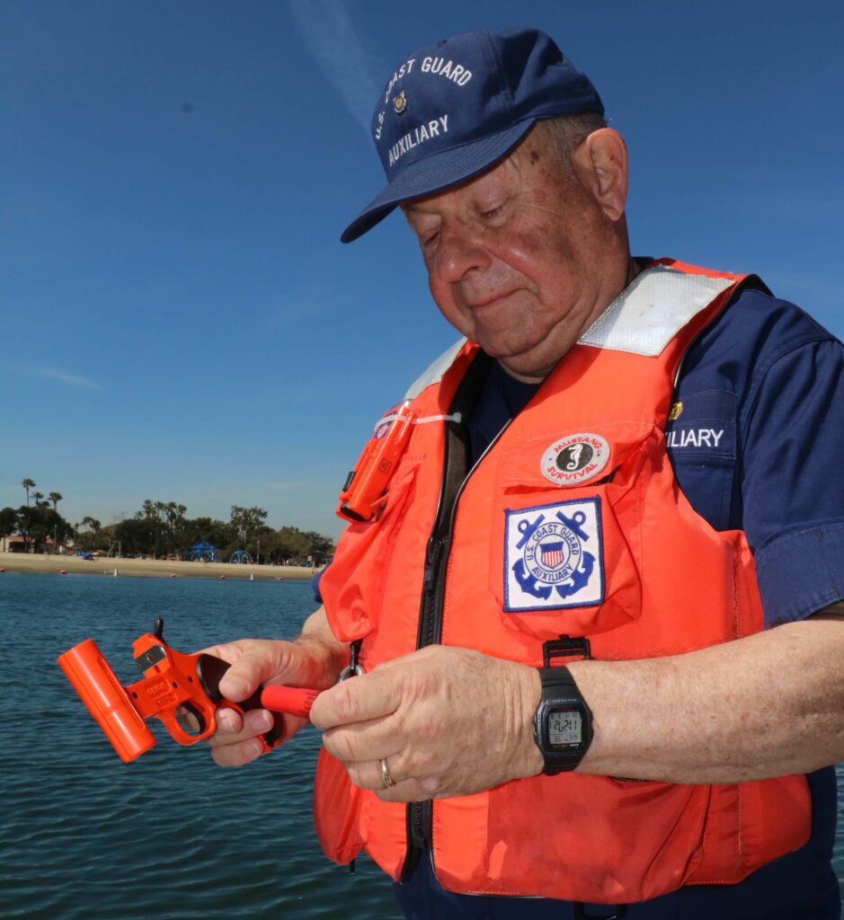 Coast Guard Auxiliary member conducts vessel safety check