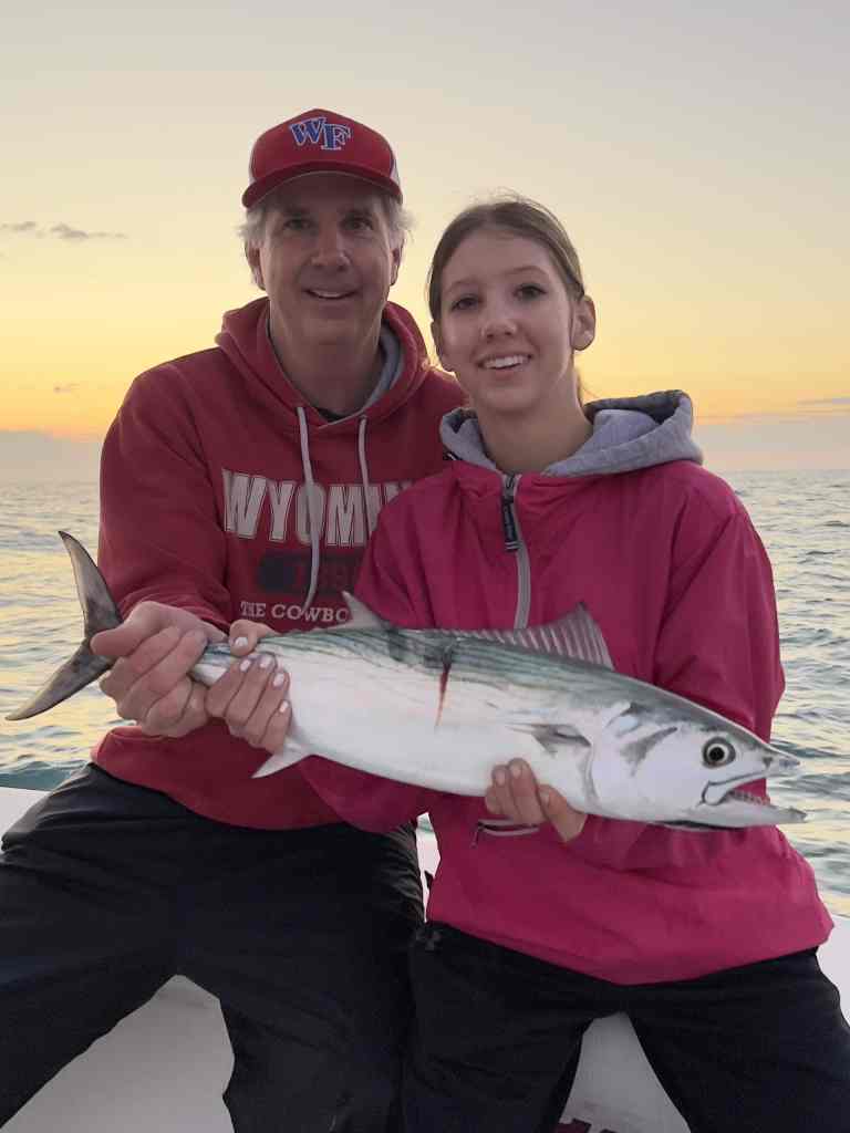pair of anglers with Atlantic bonito
