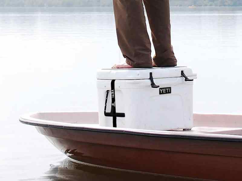SWS125-Yeti-Cooler Angler standing on a cooler