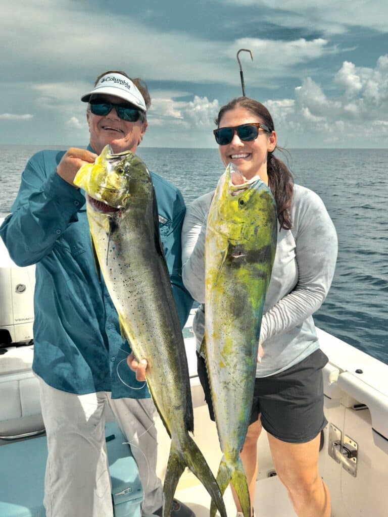 Two mahi on a boat