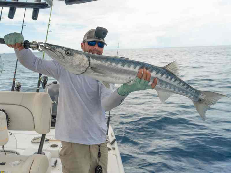 Brent Schirmer with a barracuda