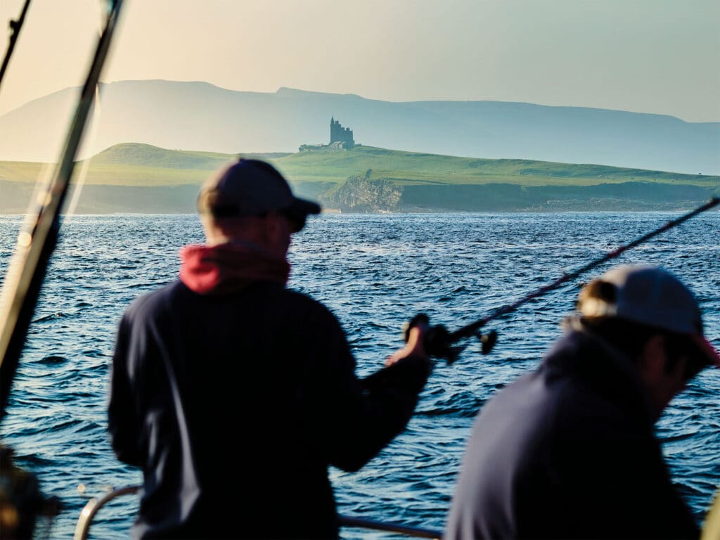 Anglers fishing off the coast of Ireland