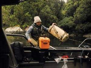 Loading bags onto a boat
