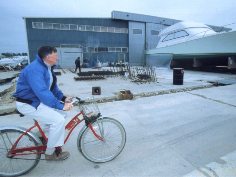 Bill Healey at Viking yachts on a bicycle.