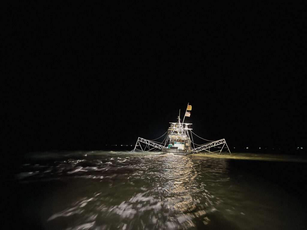Shrimp boat out dragging nets