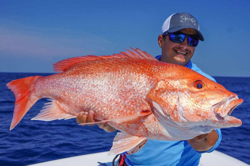Angler with large red snapper