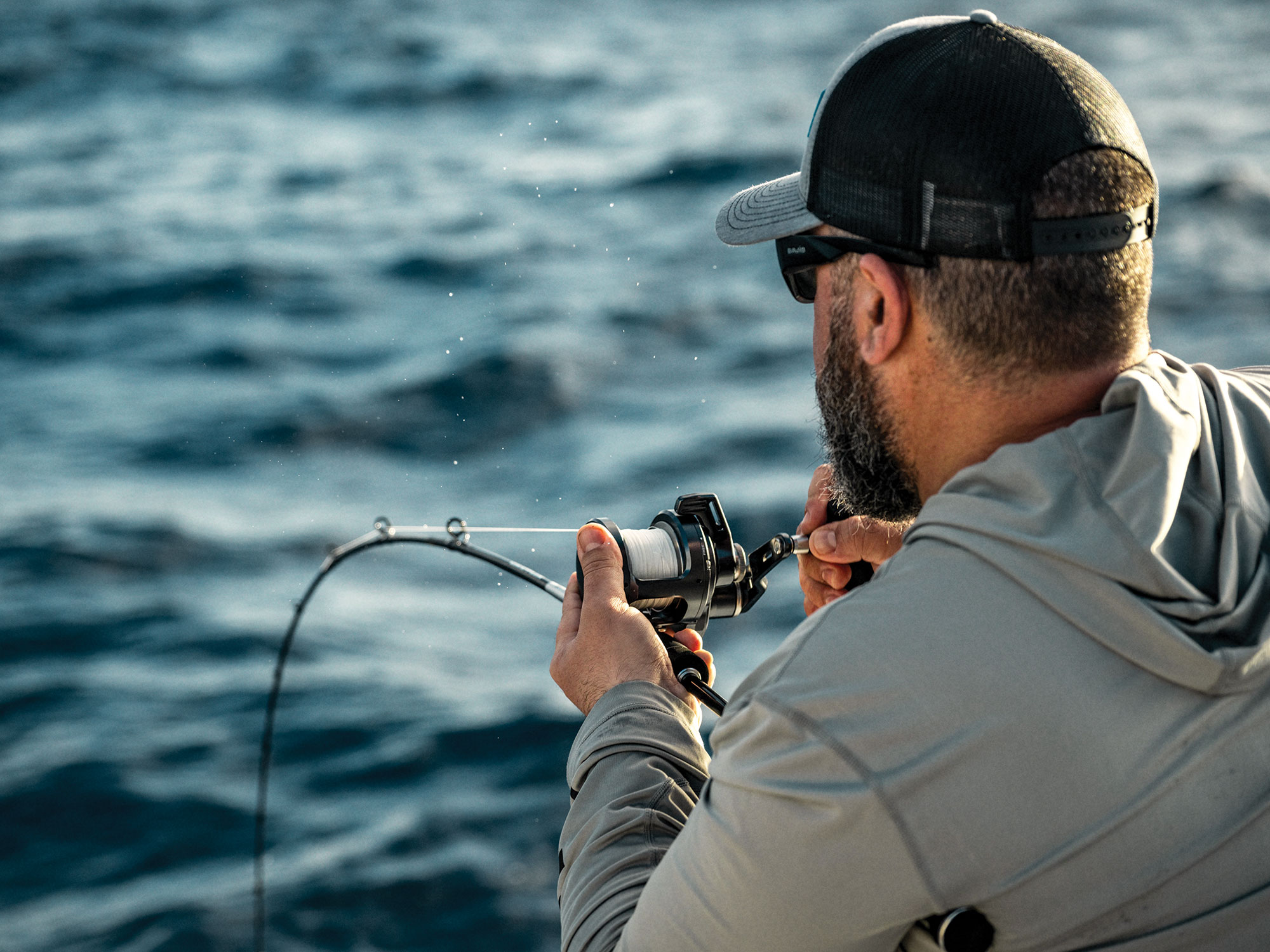 Angler with a fish on while jigging