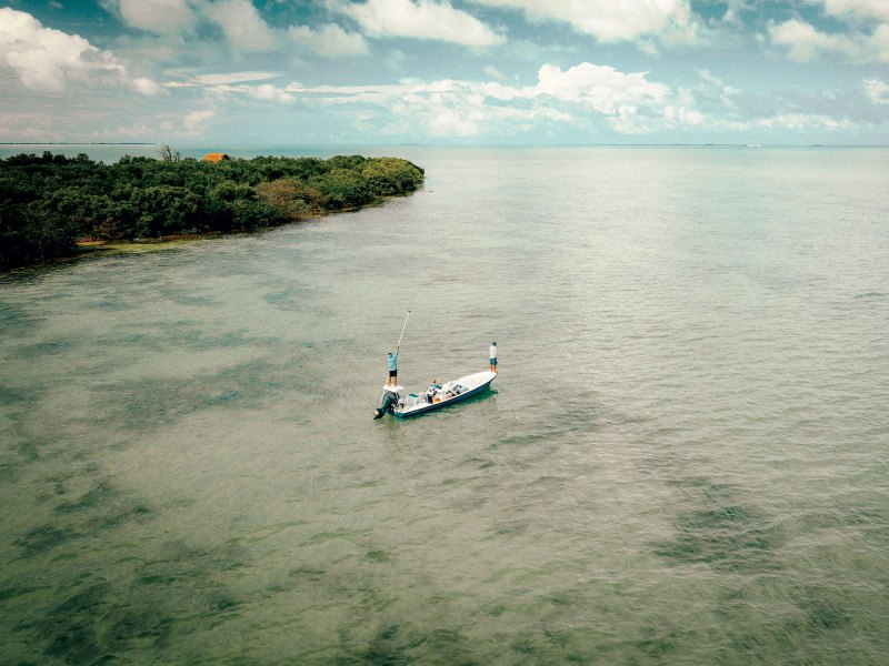 Poling around Turneffe Atoll