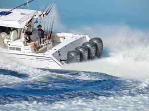 Fishing boat with quad outboards
